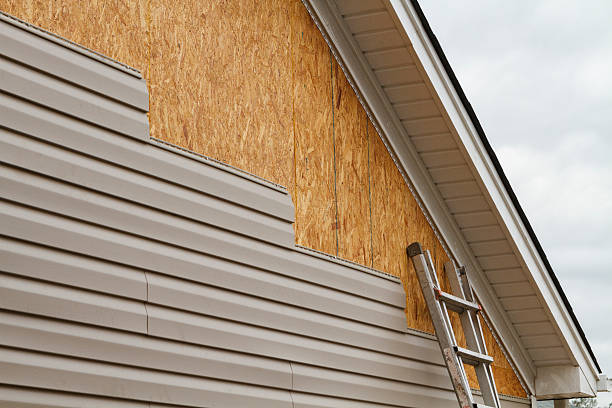 Professional Siding technician working in Prides Crossing, MA